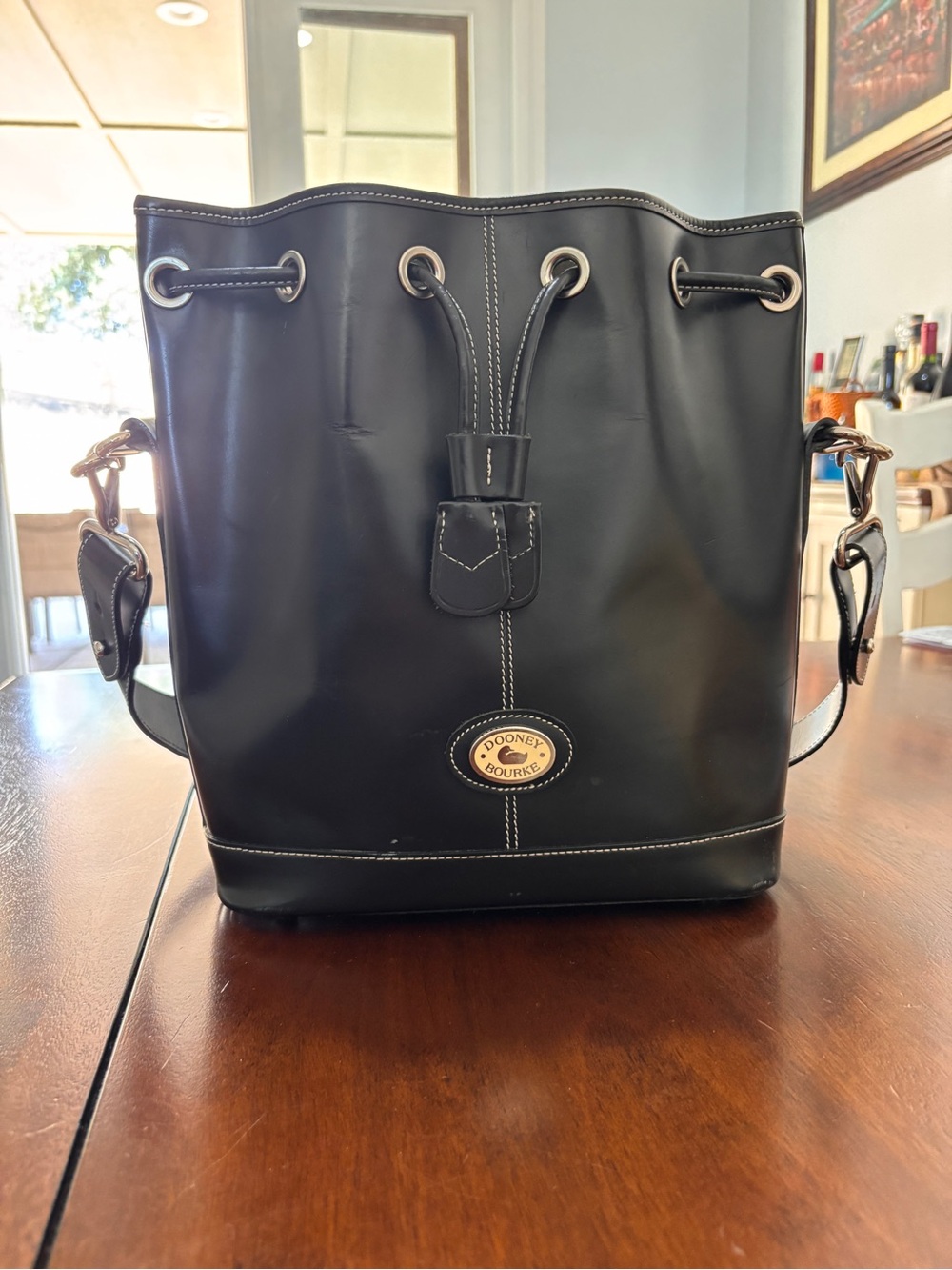 Dooney & Bourke Black Leather Drawstring Bucket Tote with Gold Hardware